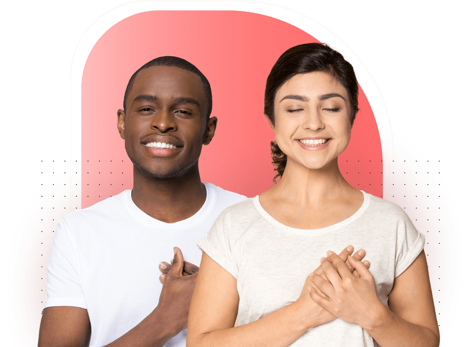 Man and woman smiling with hands placed on their chest.